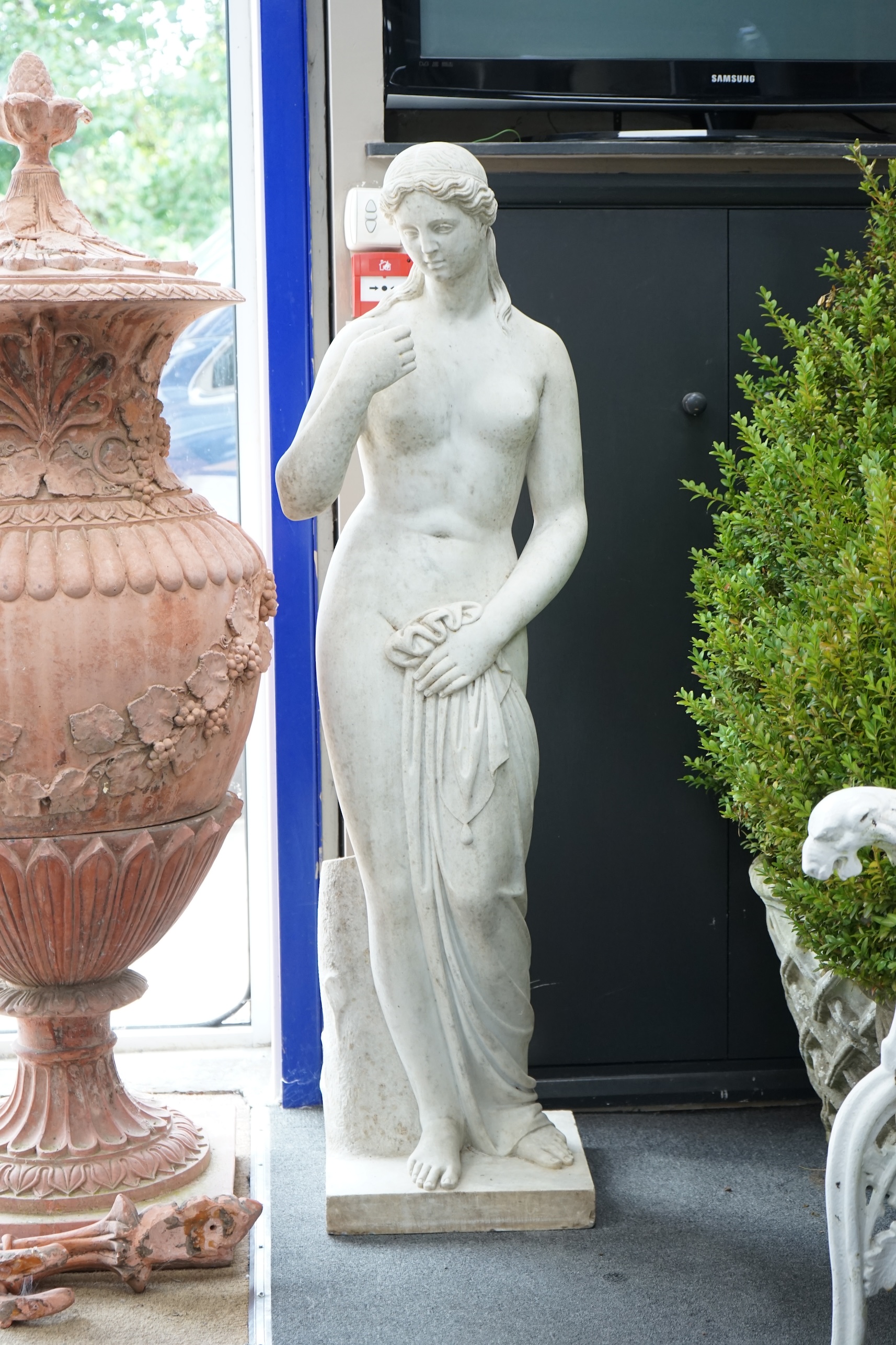 After the Antique. A large carved marble figure of Venus